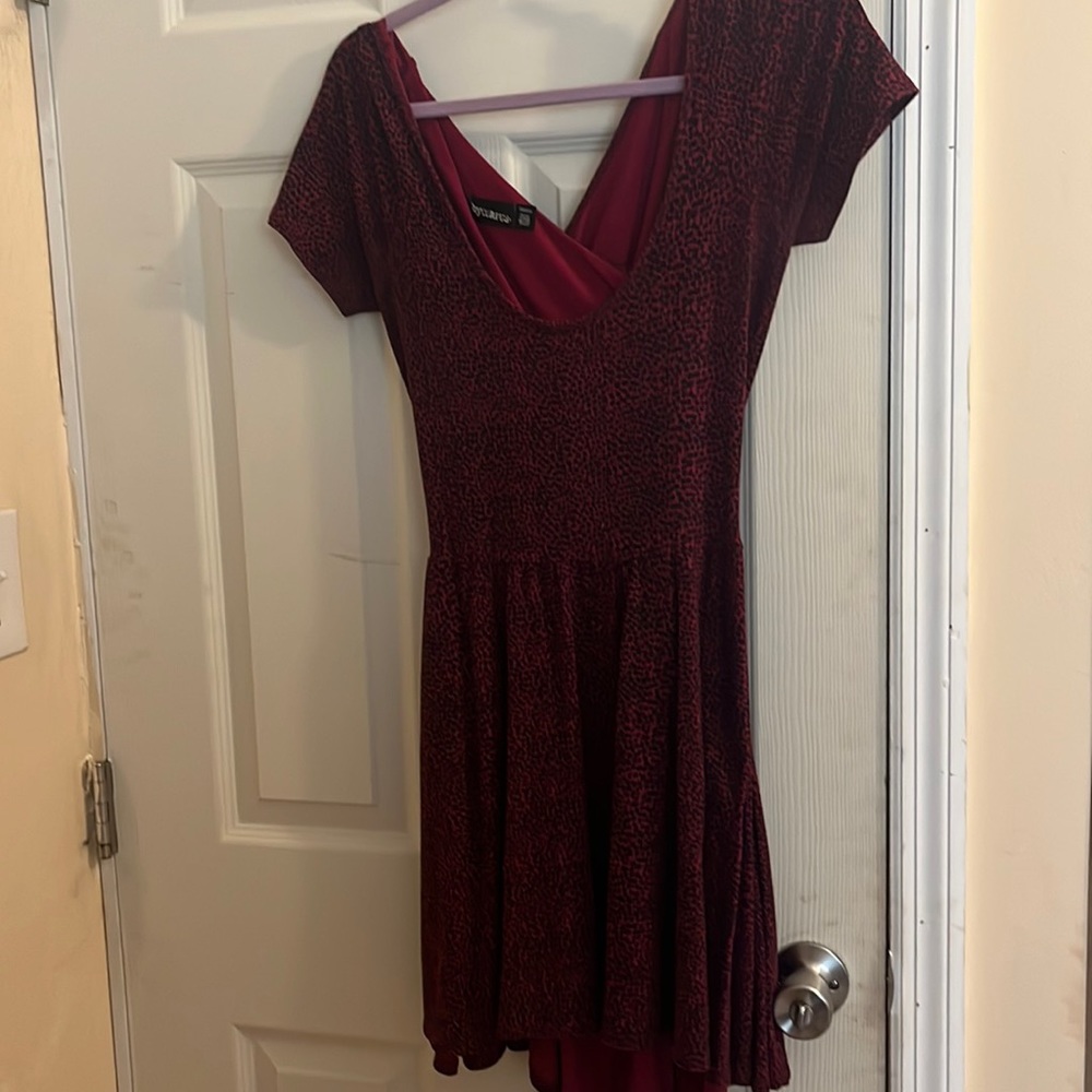 Bycorpus semi open back dress